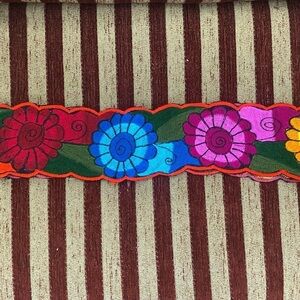 NWOT Vibrant colored floral adjustable belt.